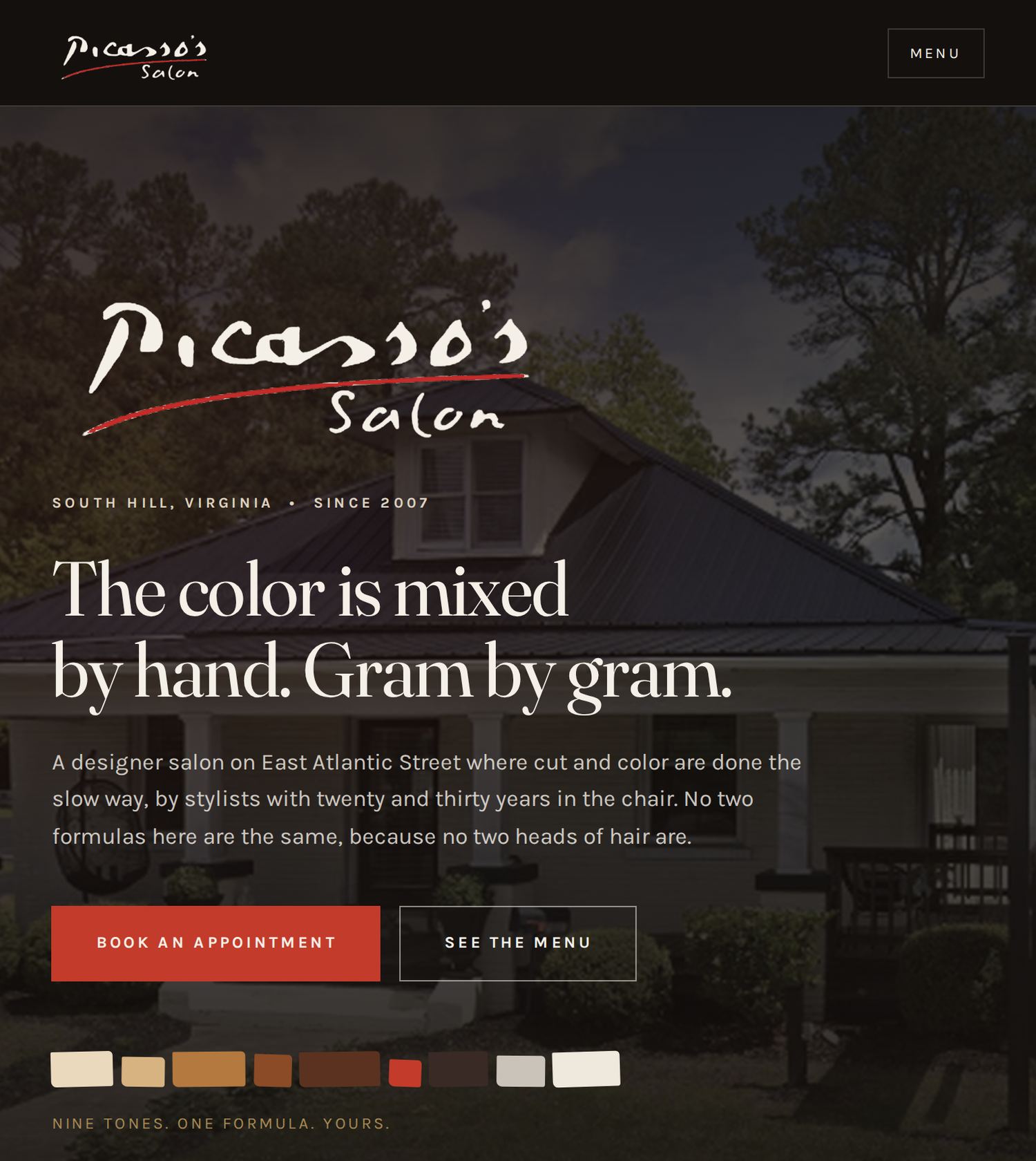 The same home page shown at laptop, tablet and phone widths